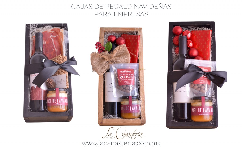 Elegantes cajas de regalo navideñas con vino y productos gourmet para empresas