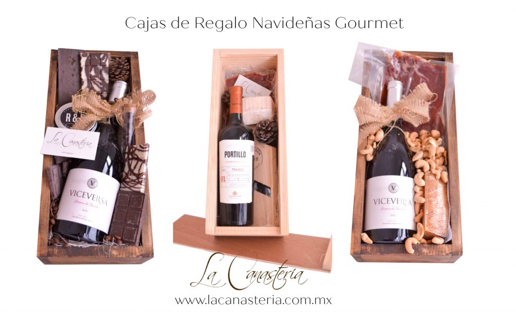 Finas cajas de regalo navideñas gourmet con vino jamón serrano y queso de oveja