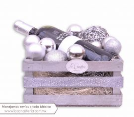 Regalos navideños económicos para empresas: arreglo de vino navideño